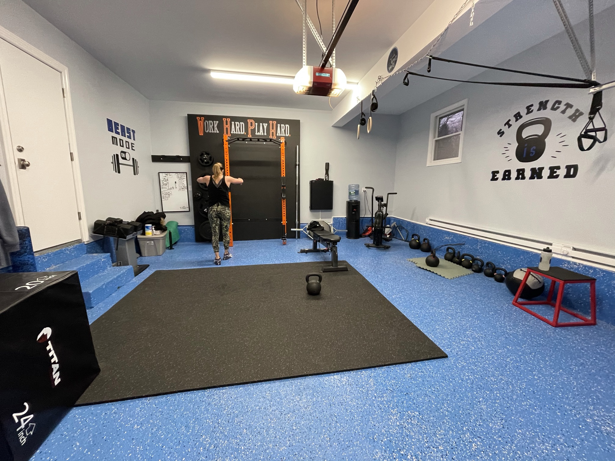 Wide view of the Dix Hills garage gym